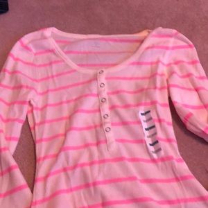 White and light pink long sleeve shirt